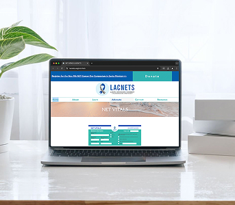 Laptop displaying the LACNETS Vital Information Tracking Document.